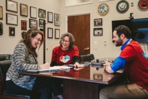 meeting between staffer on Capitol Hill and two mentoring advocates